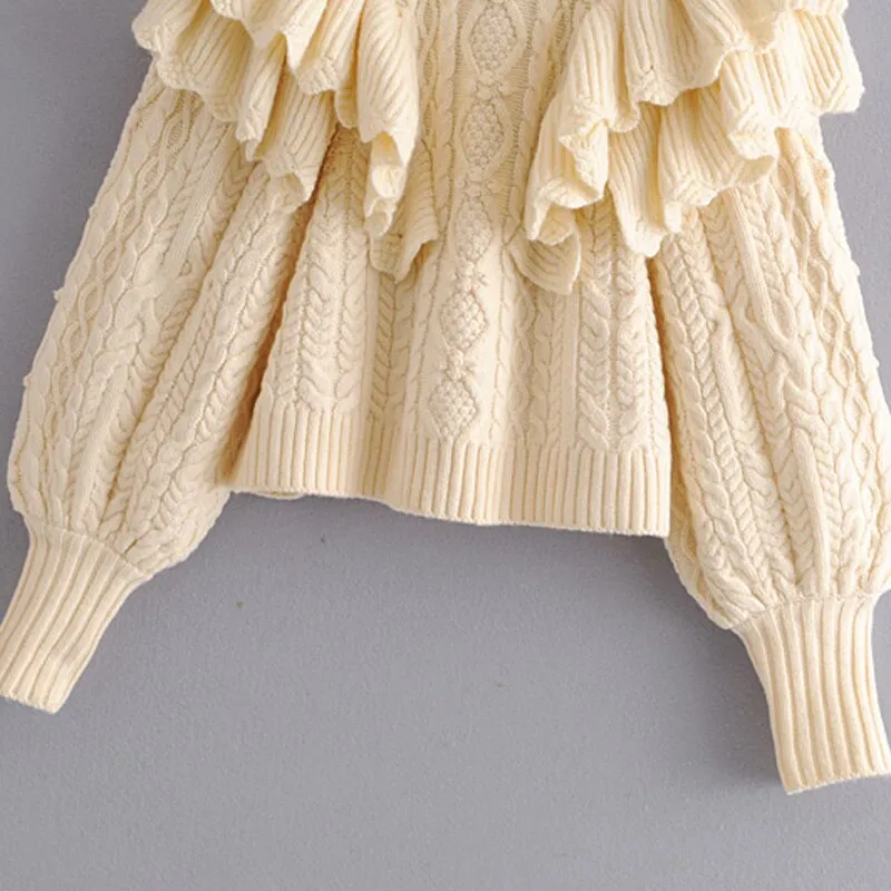 CABLE-KNIT SWEATER WITH RUFFLES