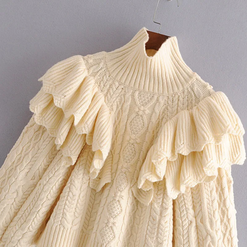 CABLE-KNIT SWEATER WITH RUFFLES
